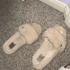 Beige worn ugg slipper